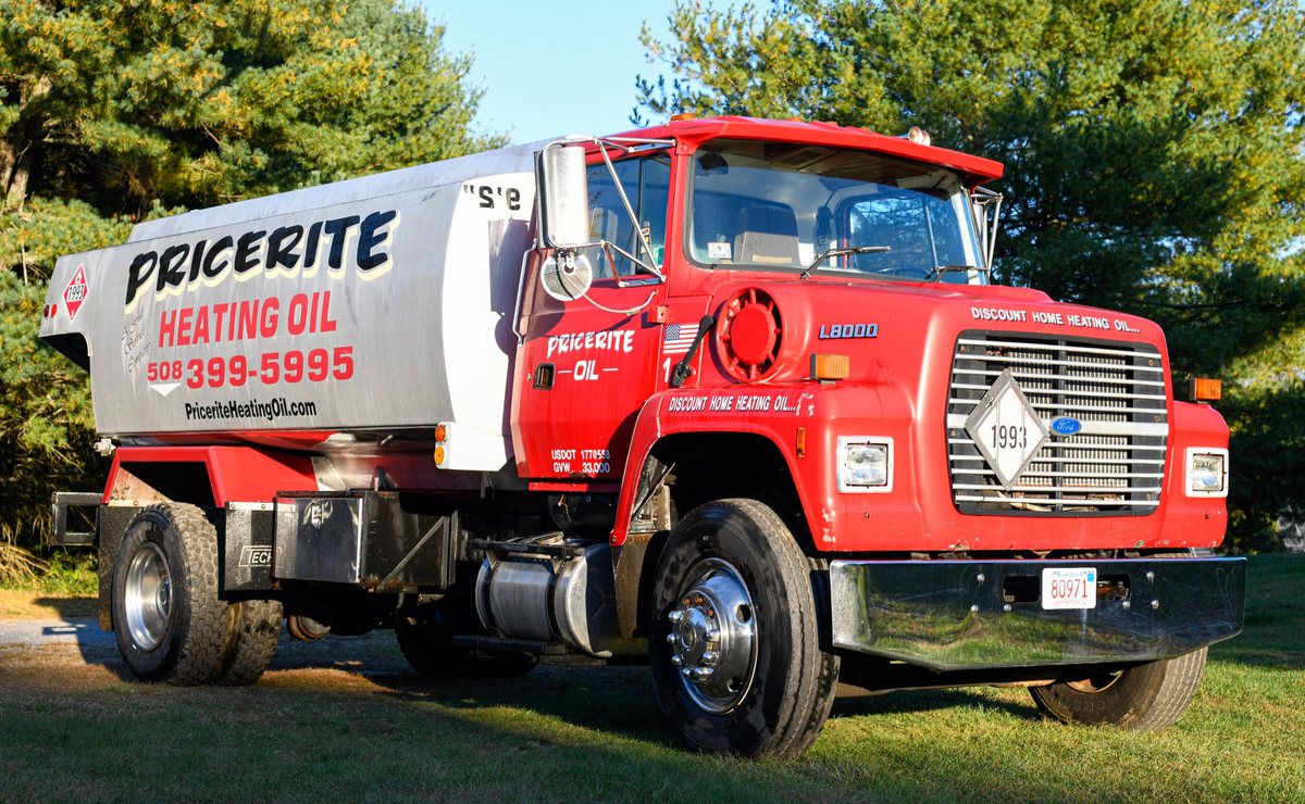 Pricerite Oil truck number one, a red Ford L8000 tank truck